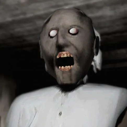 A close-up of Granny's screaming face, pale eyes wide and mouth open, in the dark of her house.